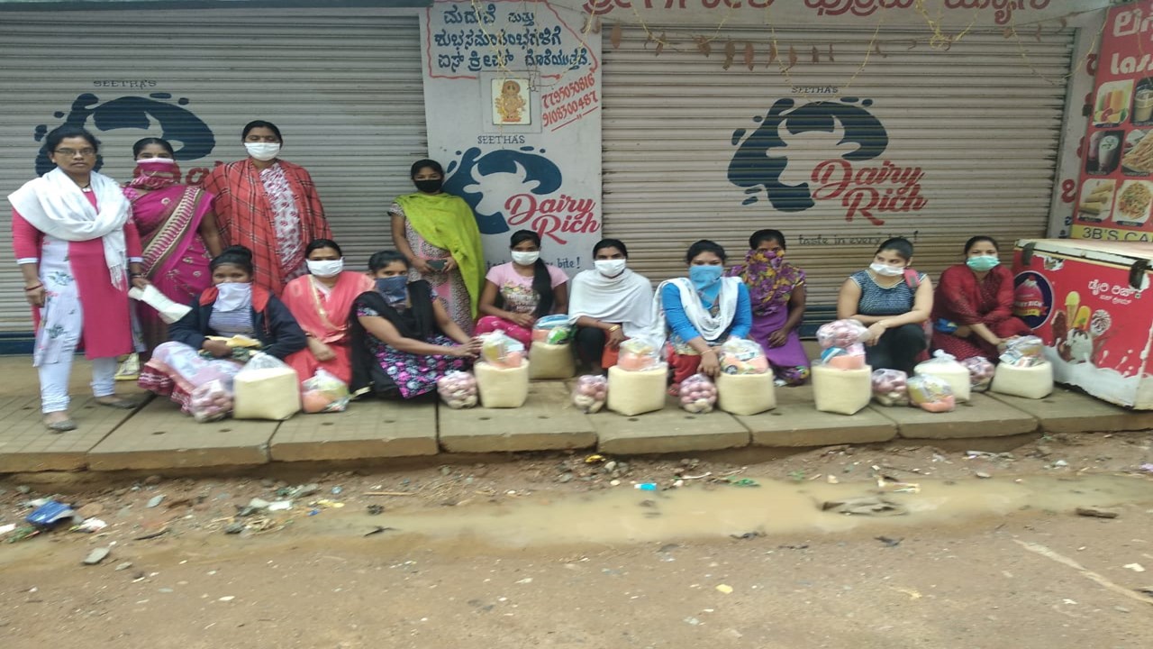 Bangalore:     Hasa Road. <br> They are mix of girls mostly Adivasi staying in a hostel supervised by a Santal girl. Being ladies, they can't go far off daily to get free lunch/dinner from govt.